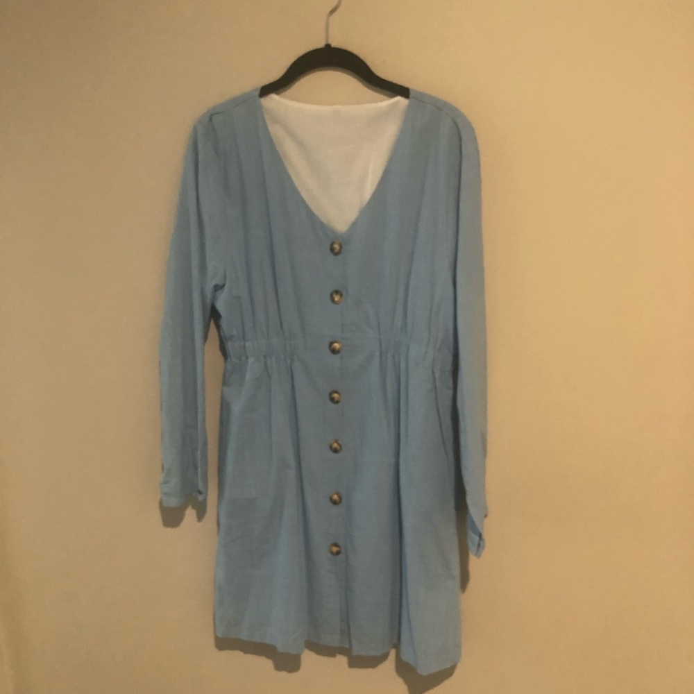 Women’s blue long sleeve dress. Brand new